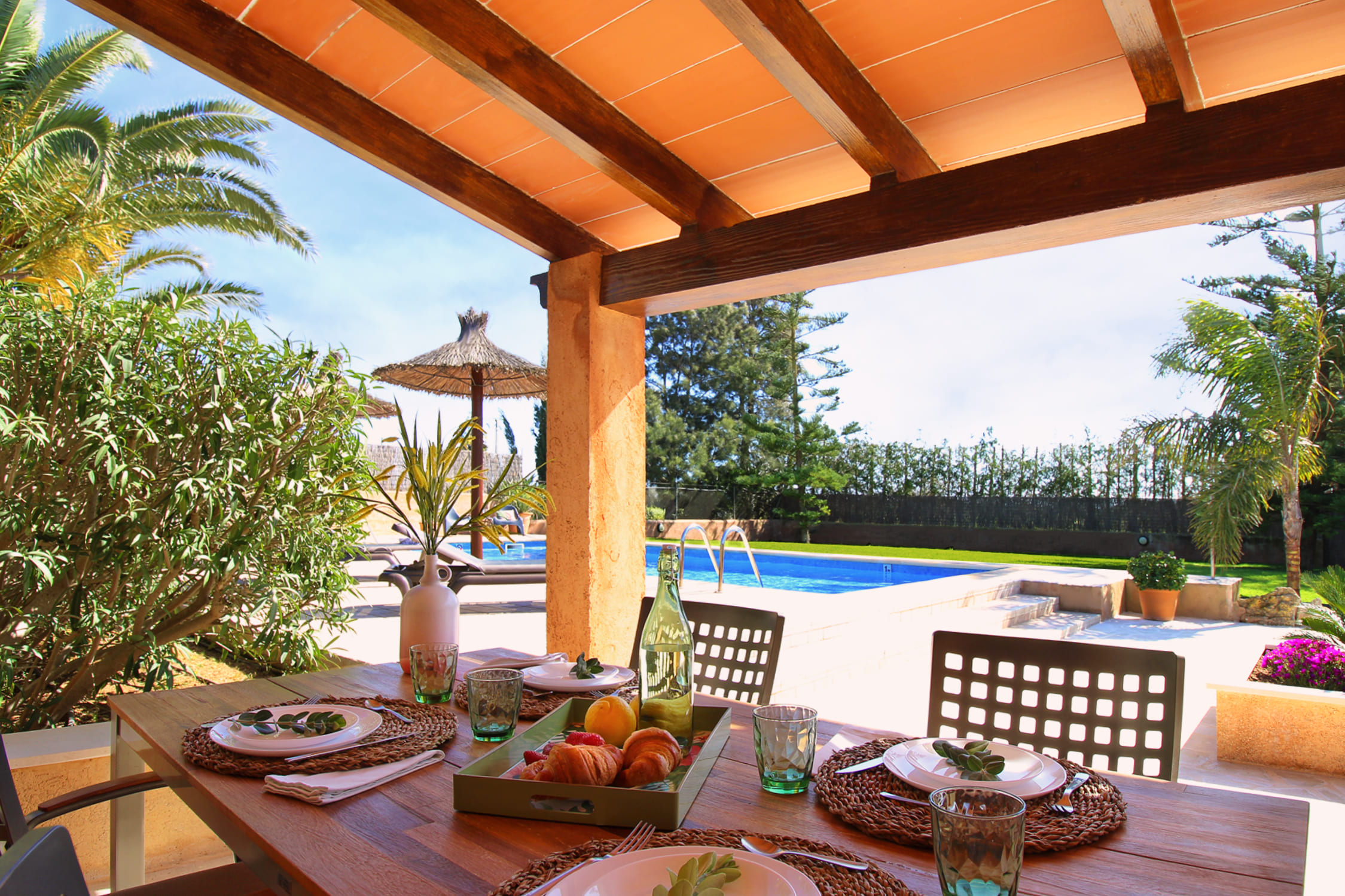 Outdoor table setting near the pool